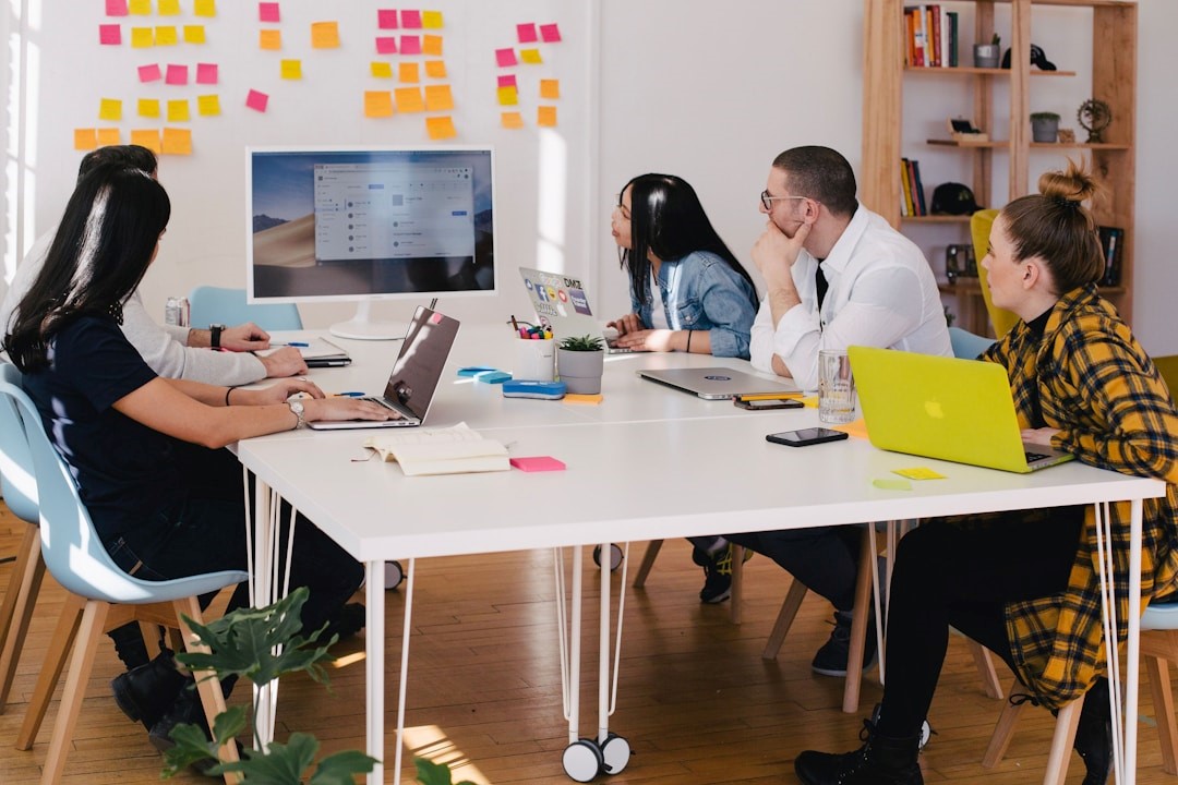 A team in an office discussing sales optimization during a meeting