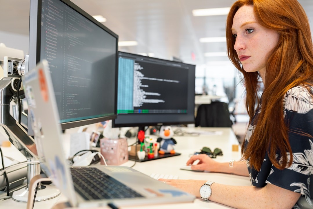 A woman in an office researching sales optimization on her computer